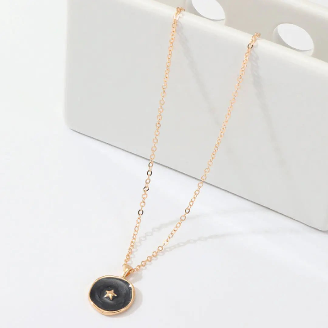 Astral Black Star Necklace – 14K Gold Plated Statement Jewelry